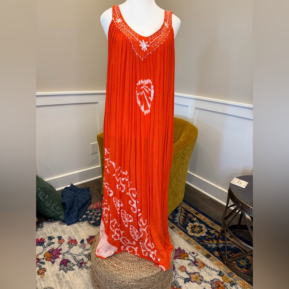 NWOT Orange with white print maxi beach coverup. One size fits most